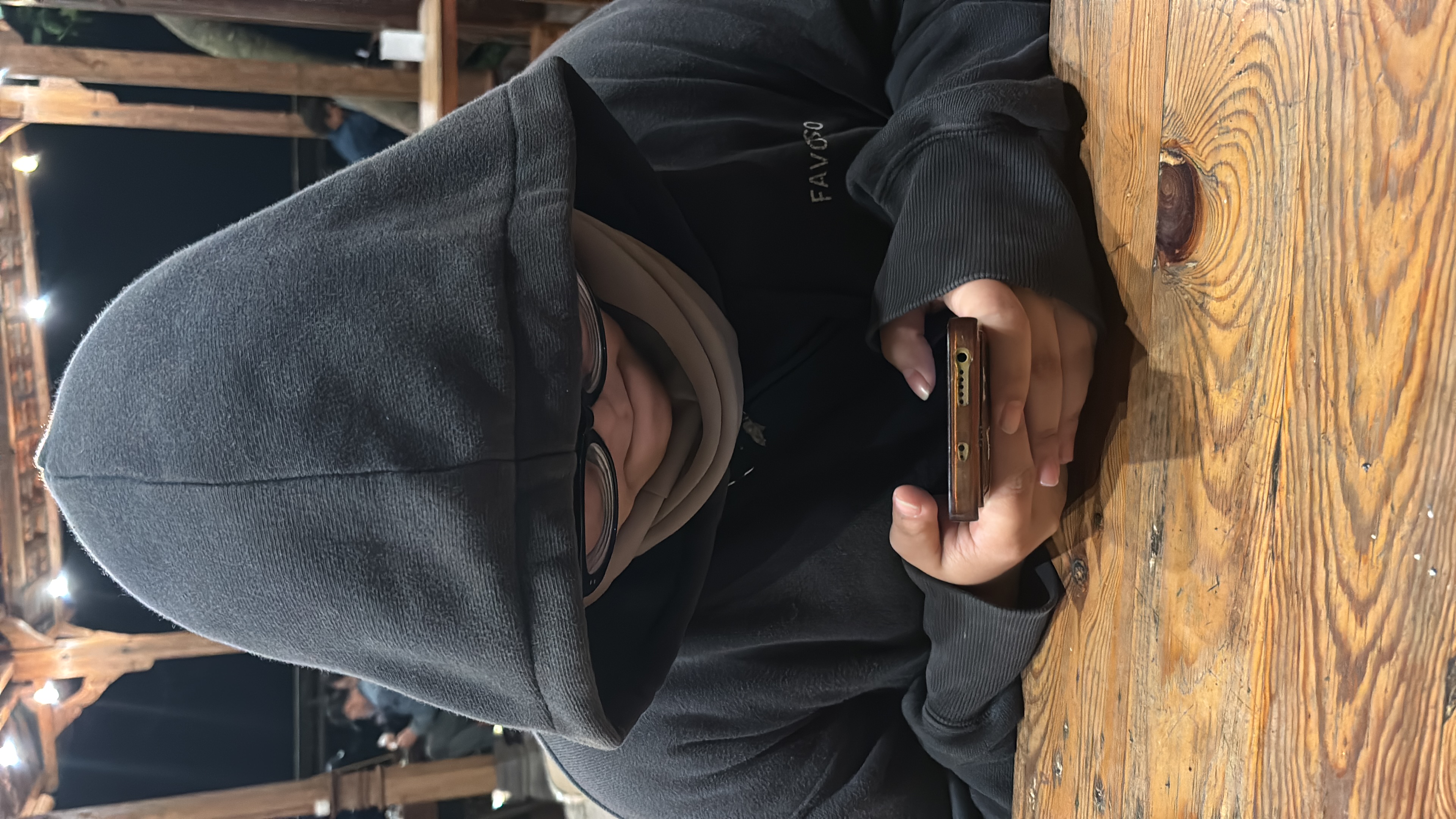 Hoodie up. Phone out. Yes, we were fighting.